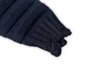 Knit cardigan sleeve cuff in dark fabric with ribbed trim