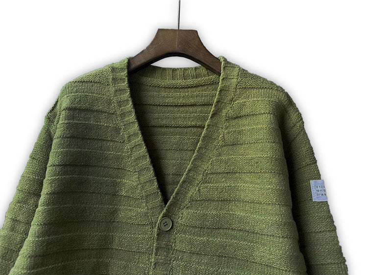 Knit cardigan with shawl collar and button placket in olive green