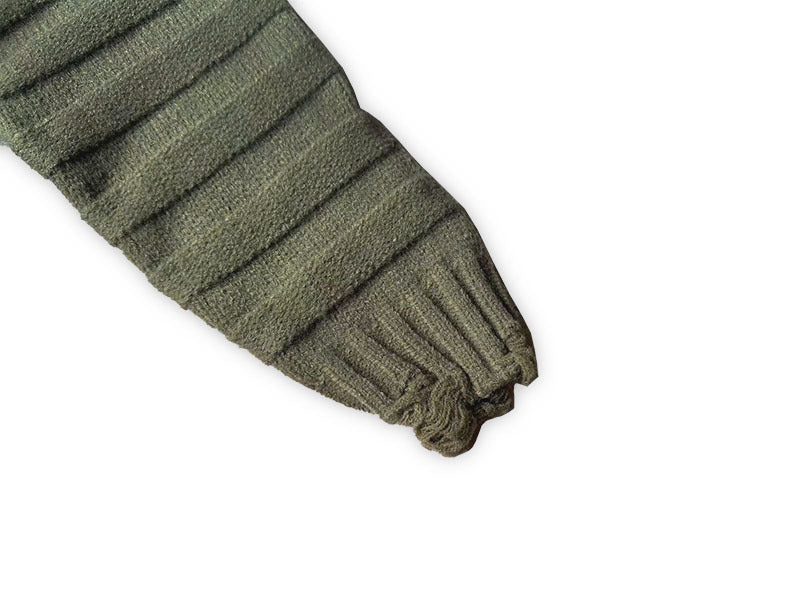 Olive green knit cardigan sleeve cuff with ribbed knit and gathered hem