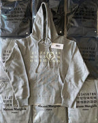 Gray Maison Margiela hoodie with drawstring hood and front logo print