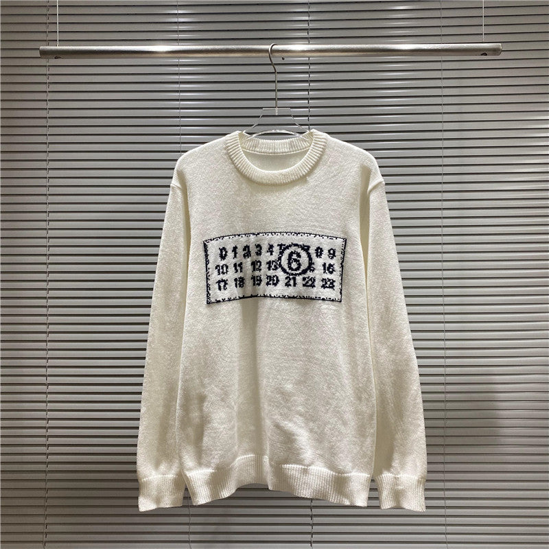 Cream crewneck knit sweater with rectangular number graphic on the chest