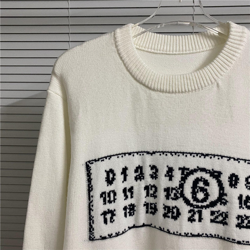 Cream crewneck knit sweater with ribbed collar and number graphic panel