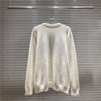 Cream crewneck knit sweater hanging display with number graphic on chest