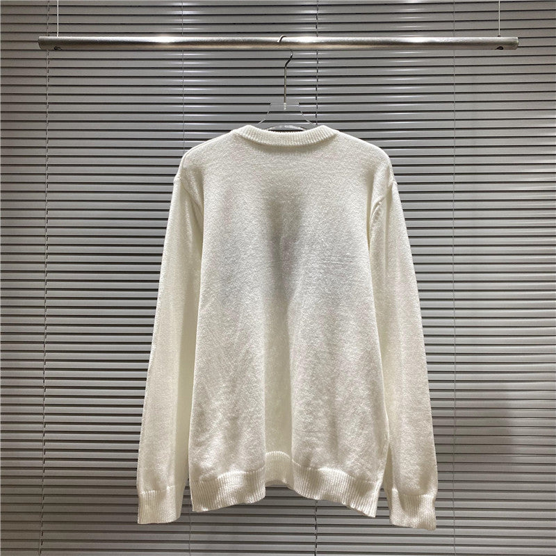 Cream crewneck knit sweater hanging display with number graphic on chest