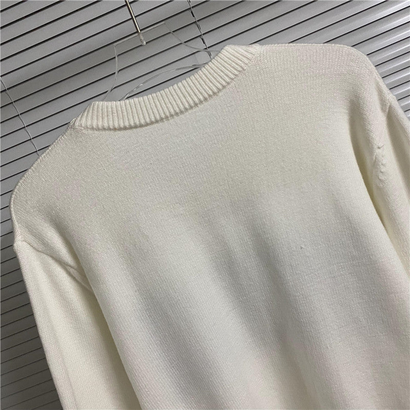 Cream crewneck knit sweater back with ribbed collar and clean plain body