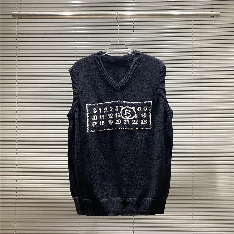 Navy sleeveless knit vest with V-neck and number graphic patch on chest