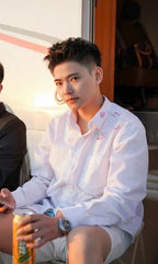 White button-up shirt with red lip print worn by model