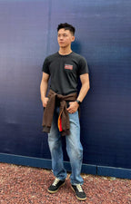 Black crew-neck T-shirt with 'I'm a fan' chest logo