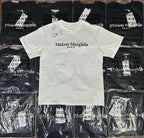 White short-sleeve T-shirt with Maison Margiela PARIS logo and barcode tag on chest