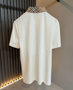Burberry short-sleeve polo shirt back view, white knit with check collar detail