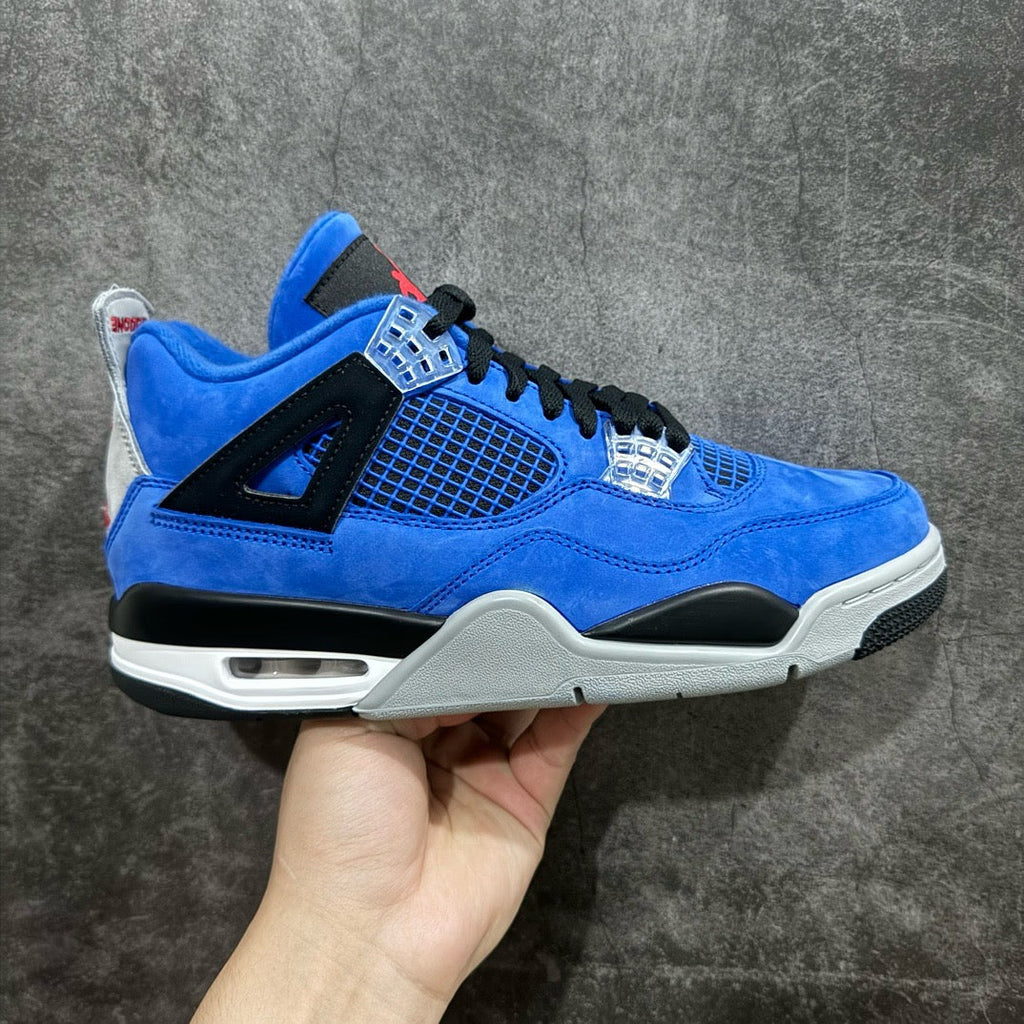 Air Jordan 4 sneakers in blue suede with black panels, clear lace piece, white midsole