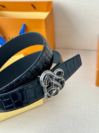 Dark navy croc belt with interlaced metal buckle, side view
