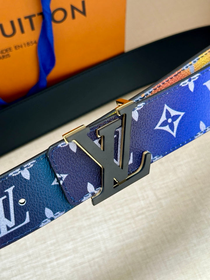 Belt buckle with gold-tone hardware and blue-and-white monogram pattern strap