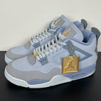 Light blue Air Jordan 4 high-top sneakers with gold Jumpman emblem on side