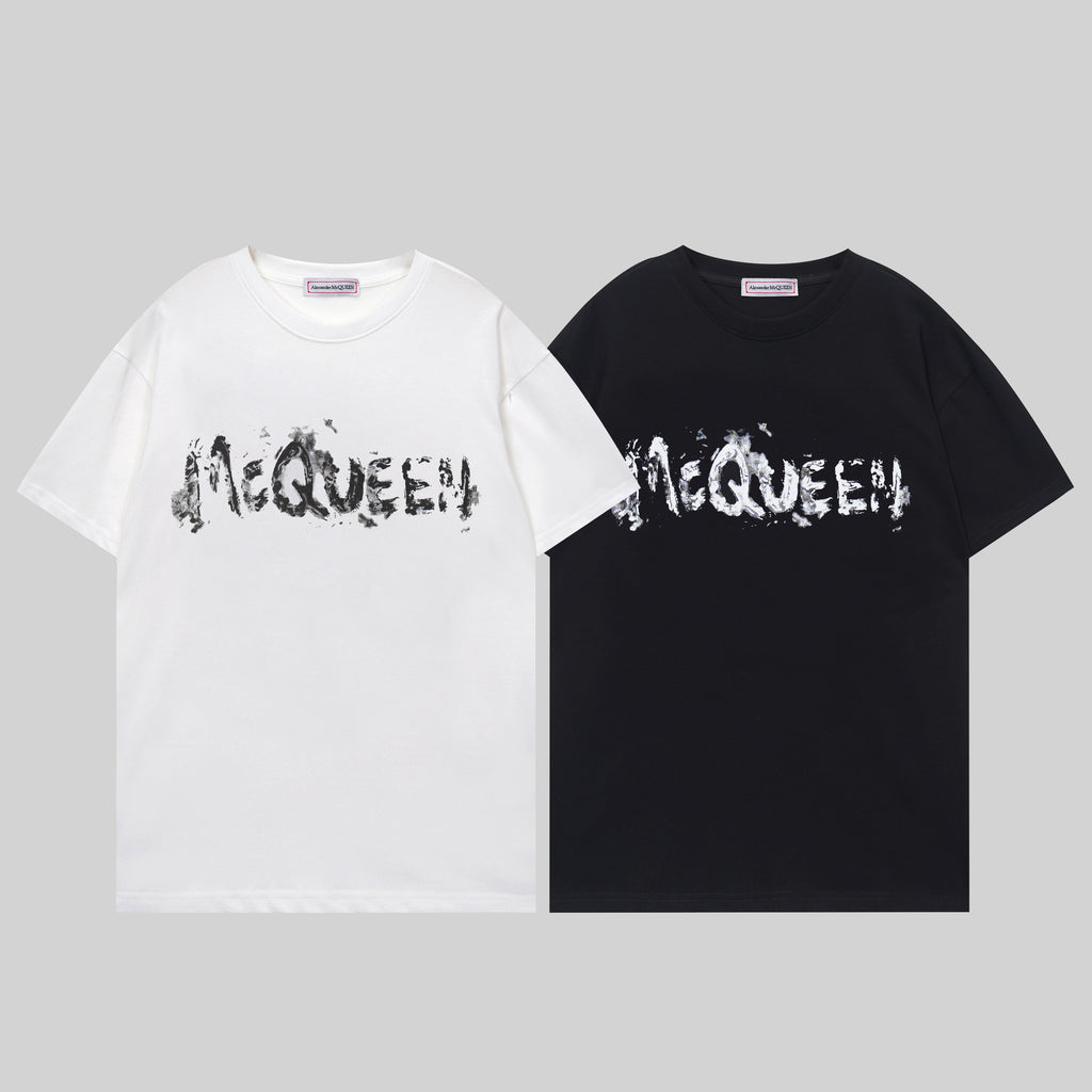 Black and white crewneck T-shirts with McQUEEN graffiti-style lettering