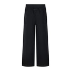 Black wide-leg trousers with elastic waistband and front seam detail