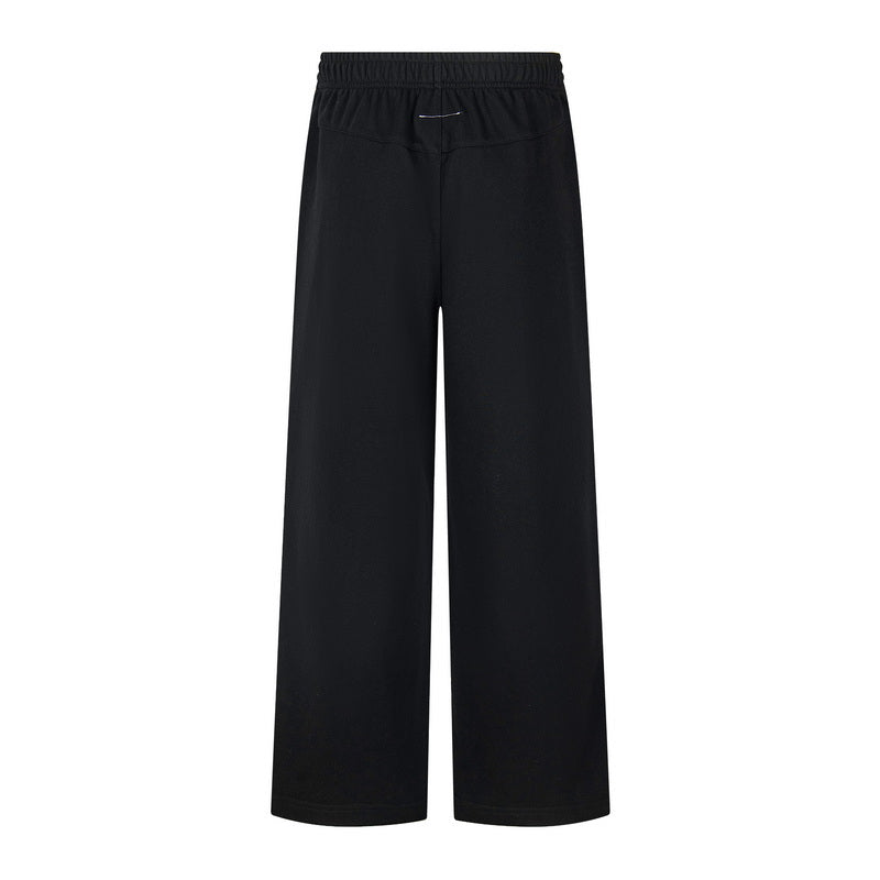 Black wide-leg trousers with elastic waistband and front seam detail