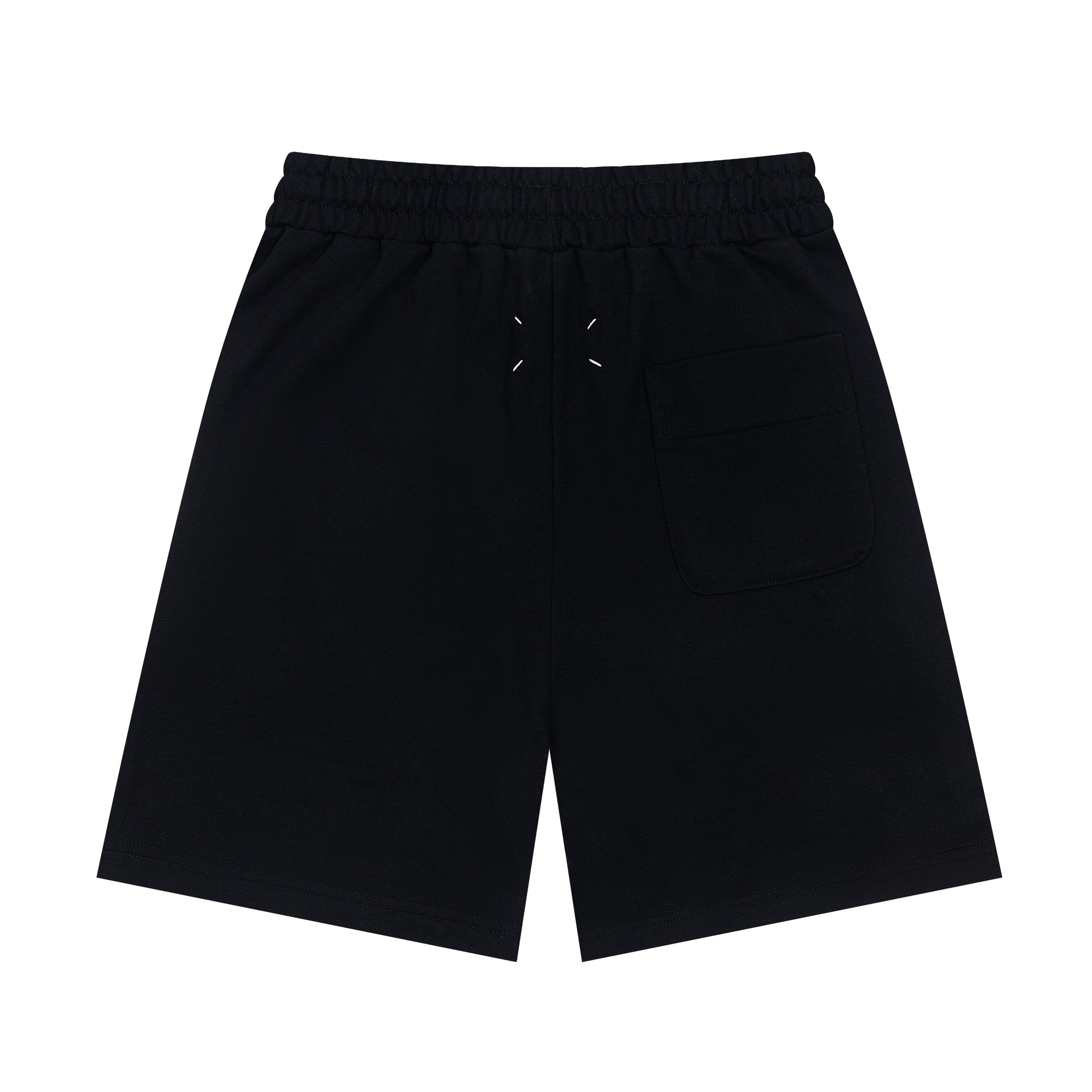 Black shorts with elastic waistband, drawstring, and side pocket