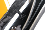 Louis Vuitton small black leather bag interior detail with card slots and logo