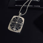 Silver square pendant necklace with filigree scroll design and round bead chain