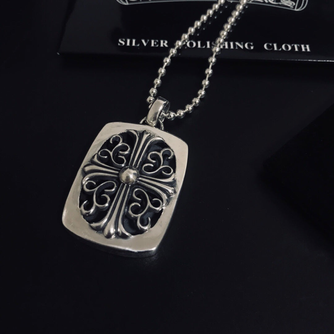 Silver square pendant necklace with filigree scroll design and round bead chain