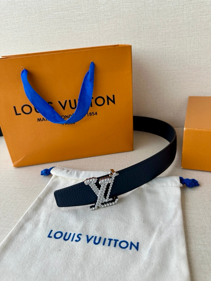 Louis Vuitton leather belt dark blue with gold-tone LV buckle, laid diagonally