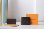 Louis Vuitton monogram small bag, dark brown canvas with short handles