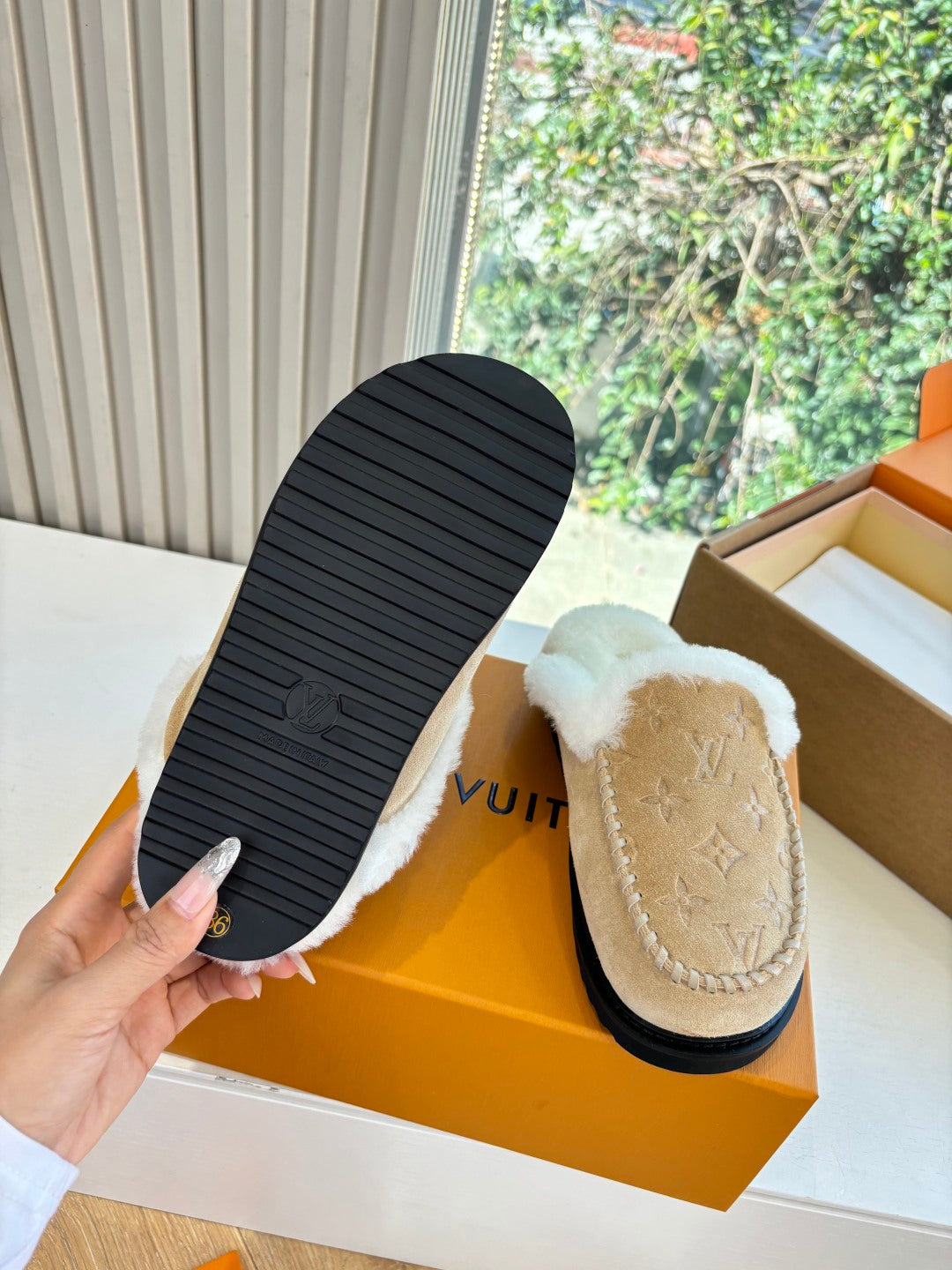 Louis Vuitton shearling moccasin slippers with textured rubber sole, tan