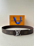 Louis Vuitton monogram belt in dark brown with rhinestone LV-style buckle, adjustable.