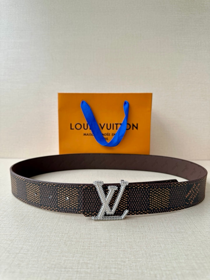 Louis Vuitton monogram belt in dark brown with rhinestone LV-style buckle, adjustable.