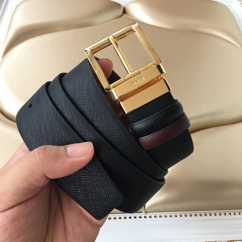 Leather belt, black textured strap with gold buckle