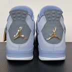 Pair of light blue Air Jordan 4 sneakers with gold Jumpman on heel