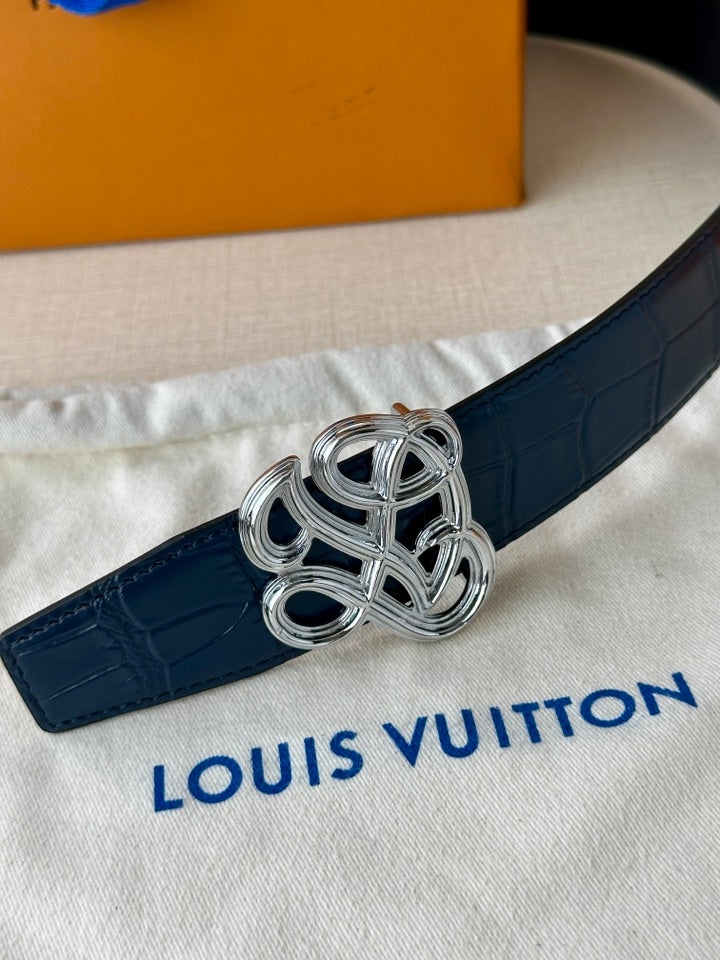 Louis Vuitton belt detail: dark blue leather with silver-tone knot buckle