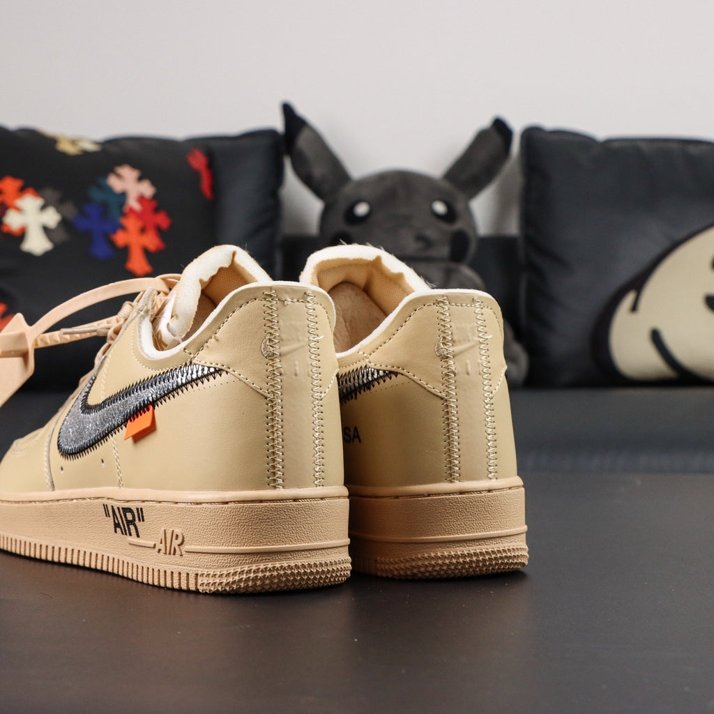 Cream Air Force 1 low-top sneakers, heel view with swoosh and visible inner lining