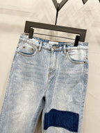 Maison Margiela denim jeans with dark knee stripe patch, front view with belt loops