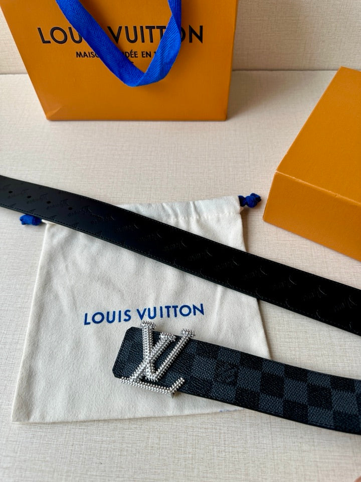 Belt laid flat with dark checkered strap and silver-toned LV buckle, featuring punched holes