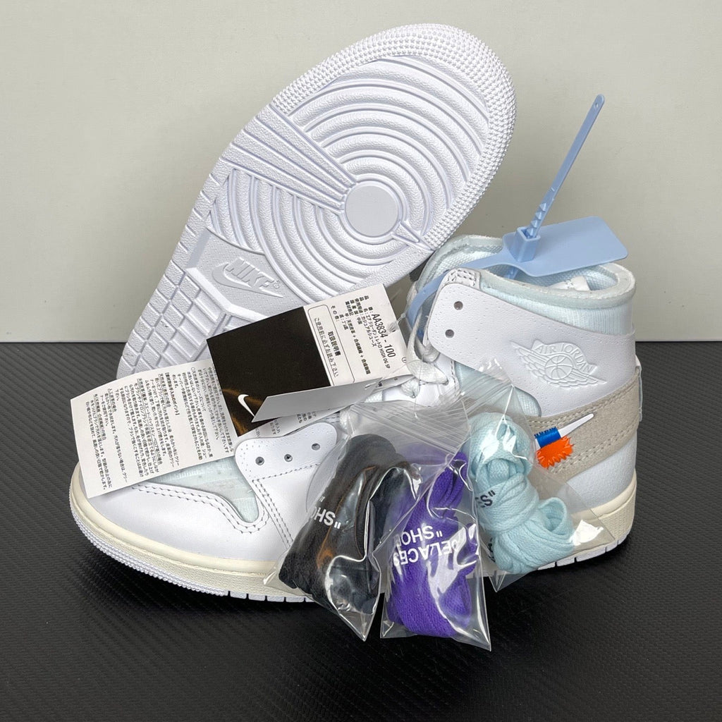 High-top sneakers with visible outsoles, white uppers and light blue lining