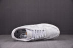 White low-top sneakers, open toe view showing white laces and lining