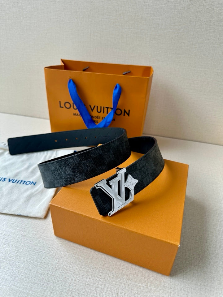 Dark leather belt with LV logo buckle, laid across a white pouch.