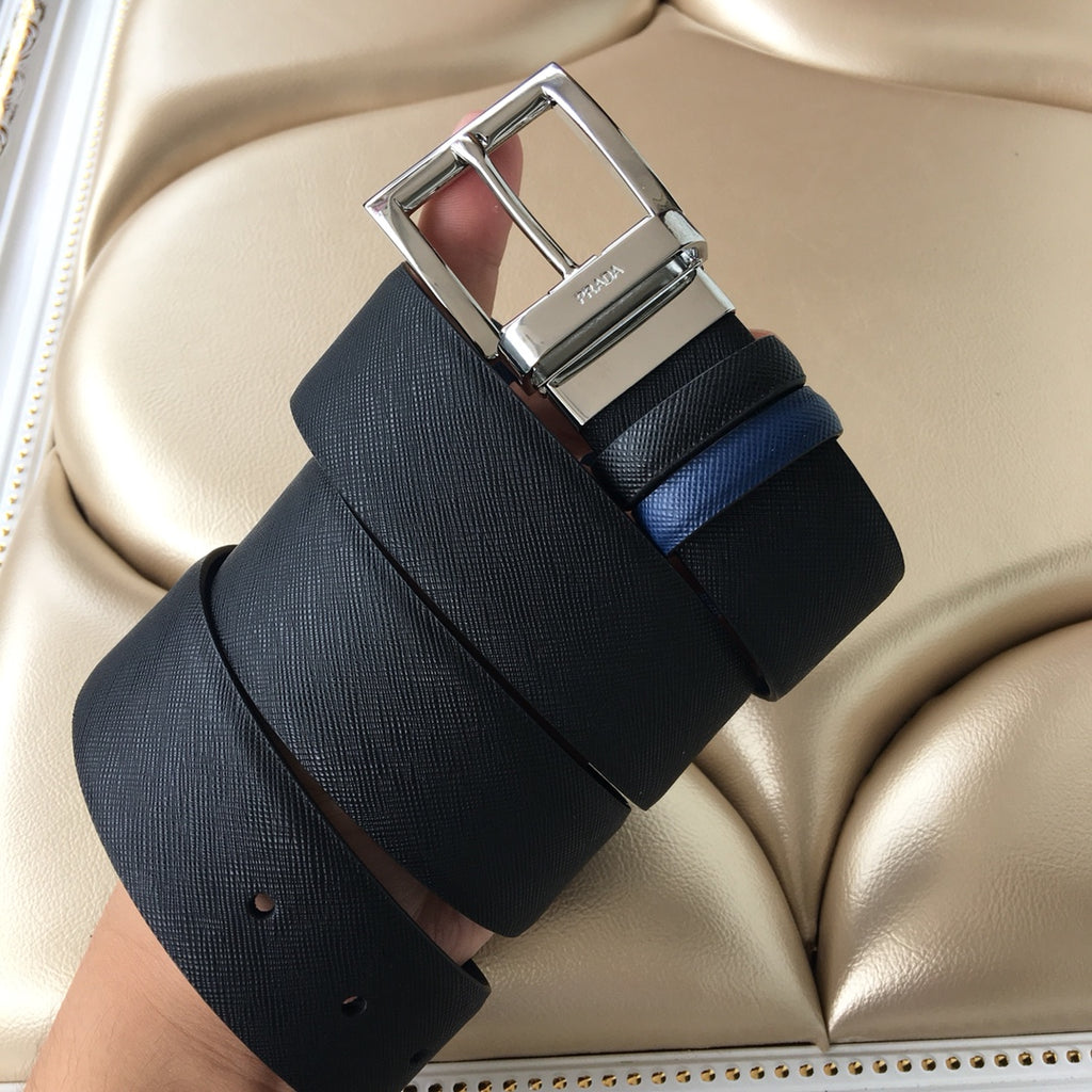 Two-tone belt with silver buckle and textured strap, dark blue and black