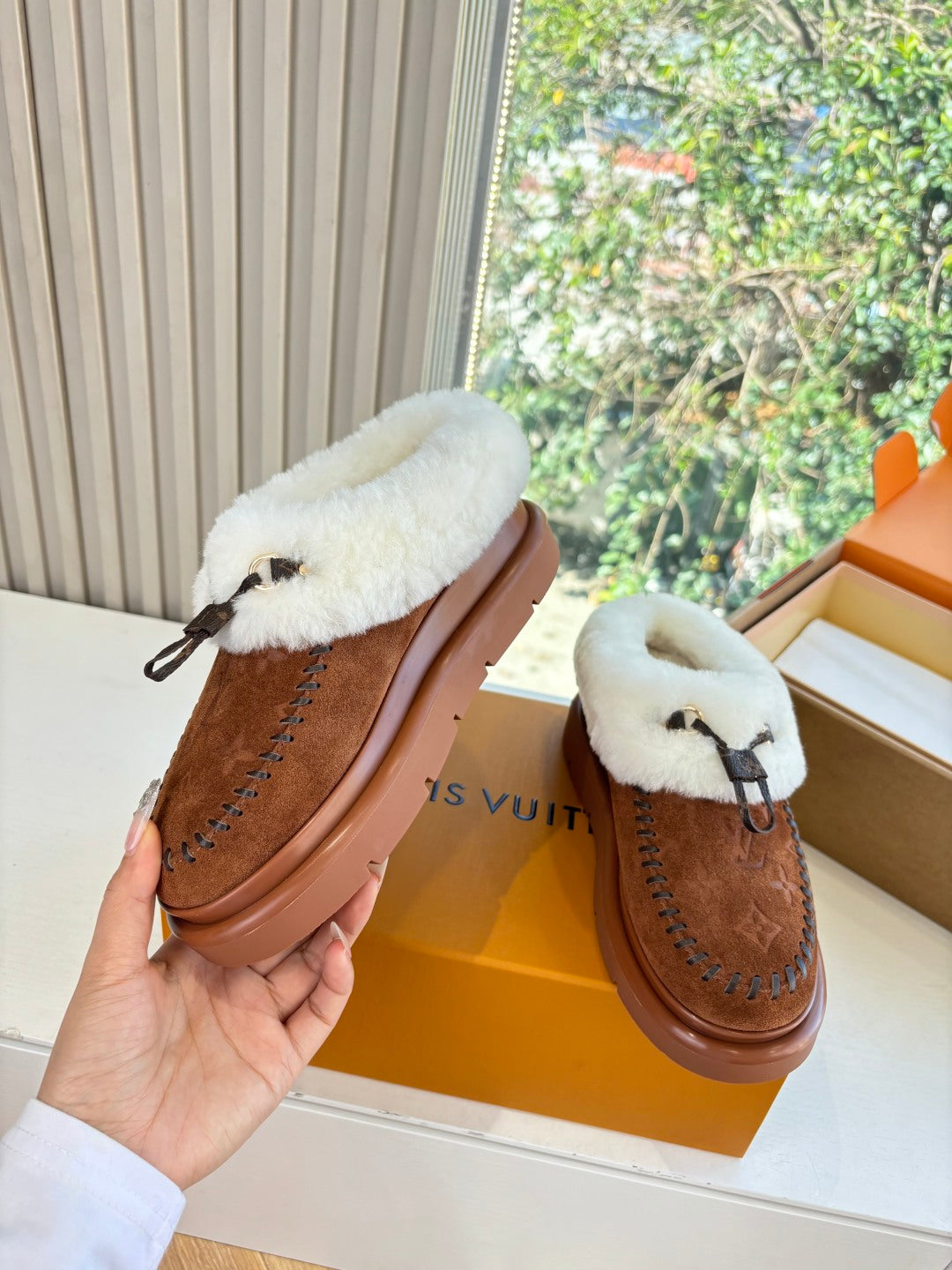 Louis Vuitton shearling suede loafers, brown with white fur strap and platform sole