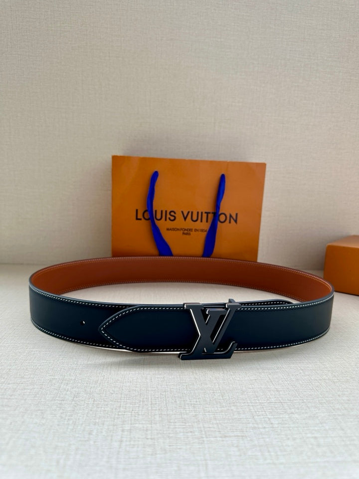 Louis Vuitton belt in dark blue leather with silver LV buckle and white edge stitching