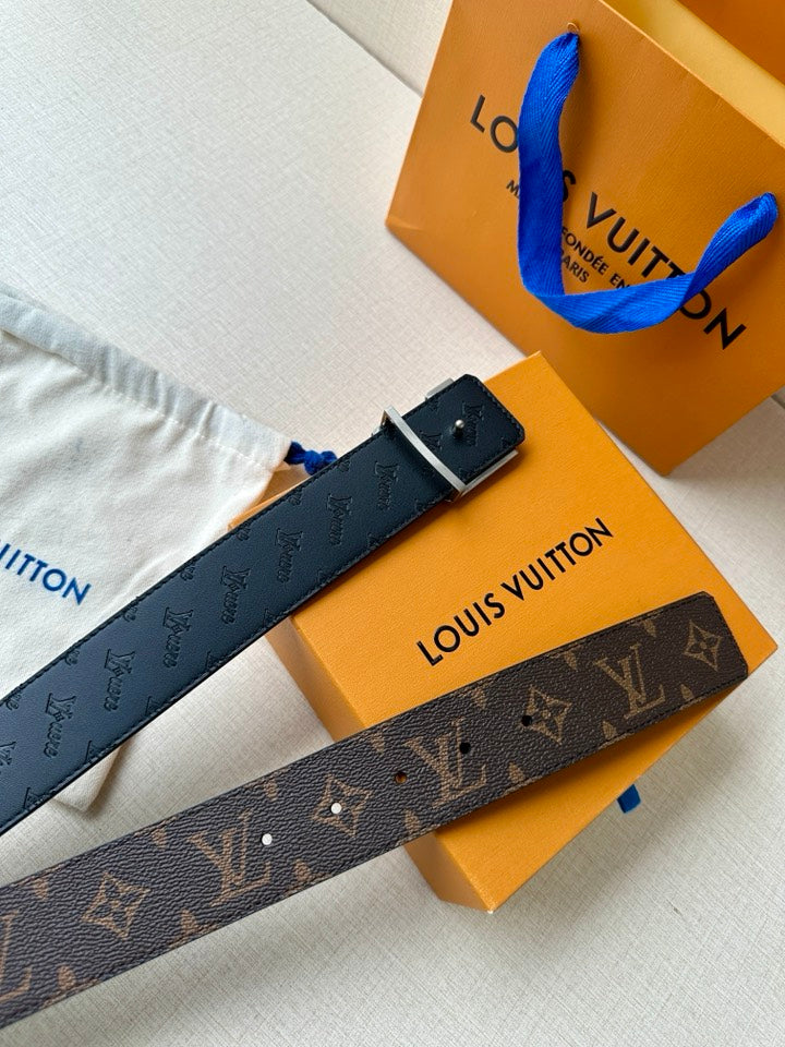 Louis Vuitton monogram belt with rectangular black keeper and dark patterned strap