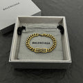 Gold-tone chain bracelet with Balenciaga logo clasp, in gift box