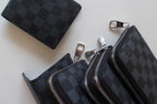 Louis Vuitton small zip pouches, dark checker pattern with silver zippers
