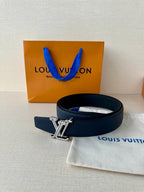 Louis Vuitton leather belt dark blue with gold-tone LV buckle and strap end detail