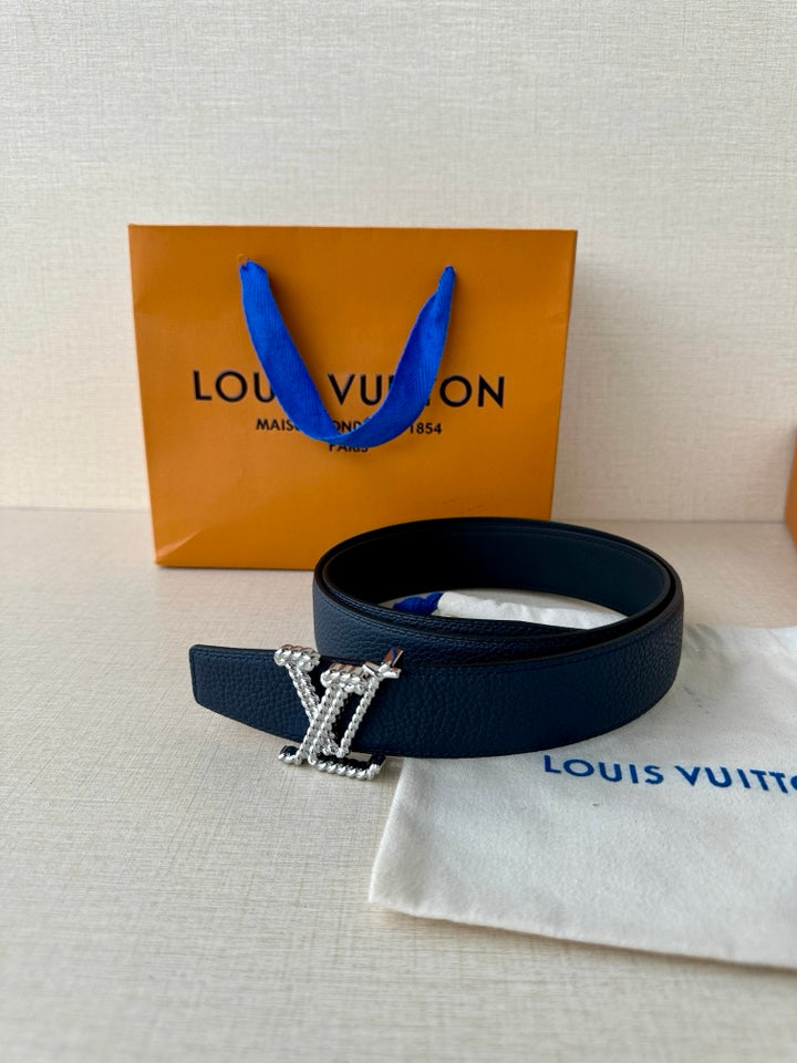 Louis Vuitton leather belt dark blue with gold-tone LV buckle and strap end detail