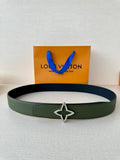 Green textured leather belt with silver star buckle centerpiece