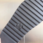 Louis Vuitton sandal outsole with textured gray tread and logo