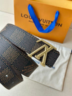 Dark monogram belt with gold LV rhinestone buckle and studded strap holes.